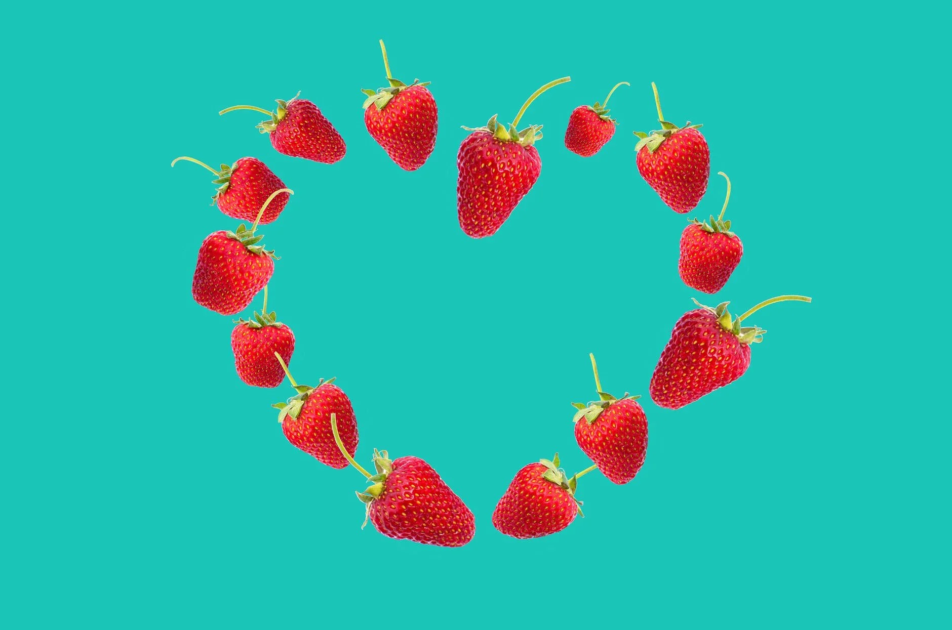 Strawberries arranged in a heart shape