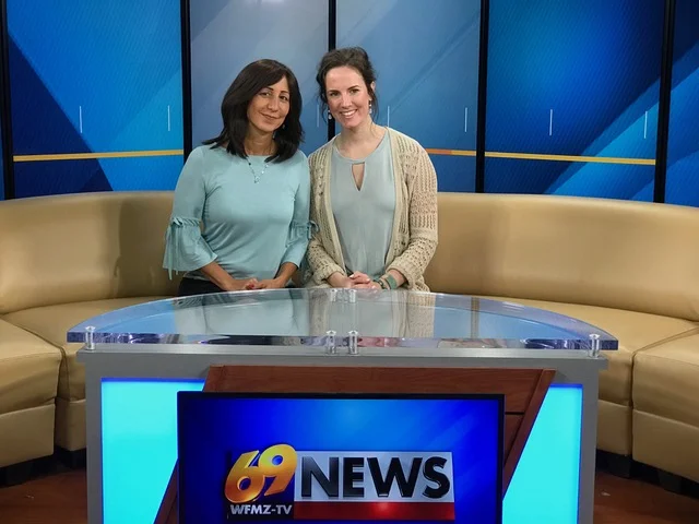 Luisa Szakacs and a WFMZ host at the news desk