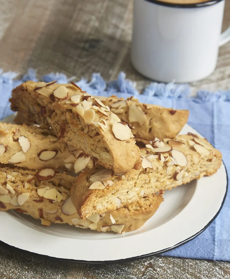 Sliced almond biscotti arranged on a plate