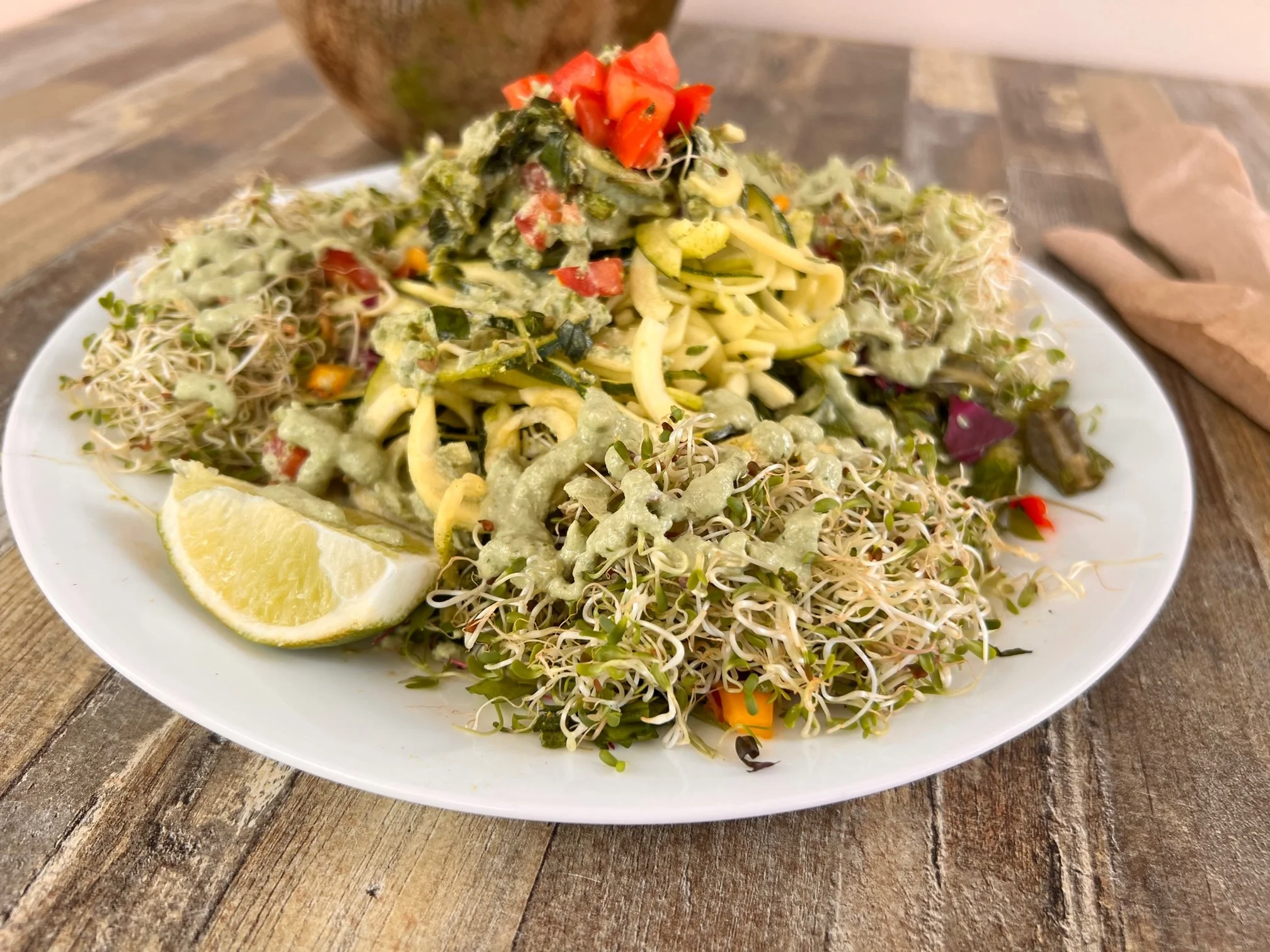 Plate of fresh sprouts and vegetables
